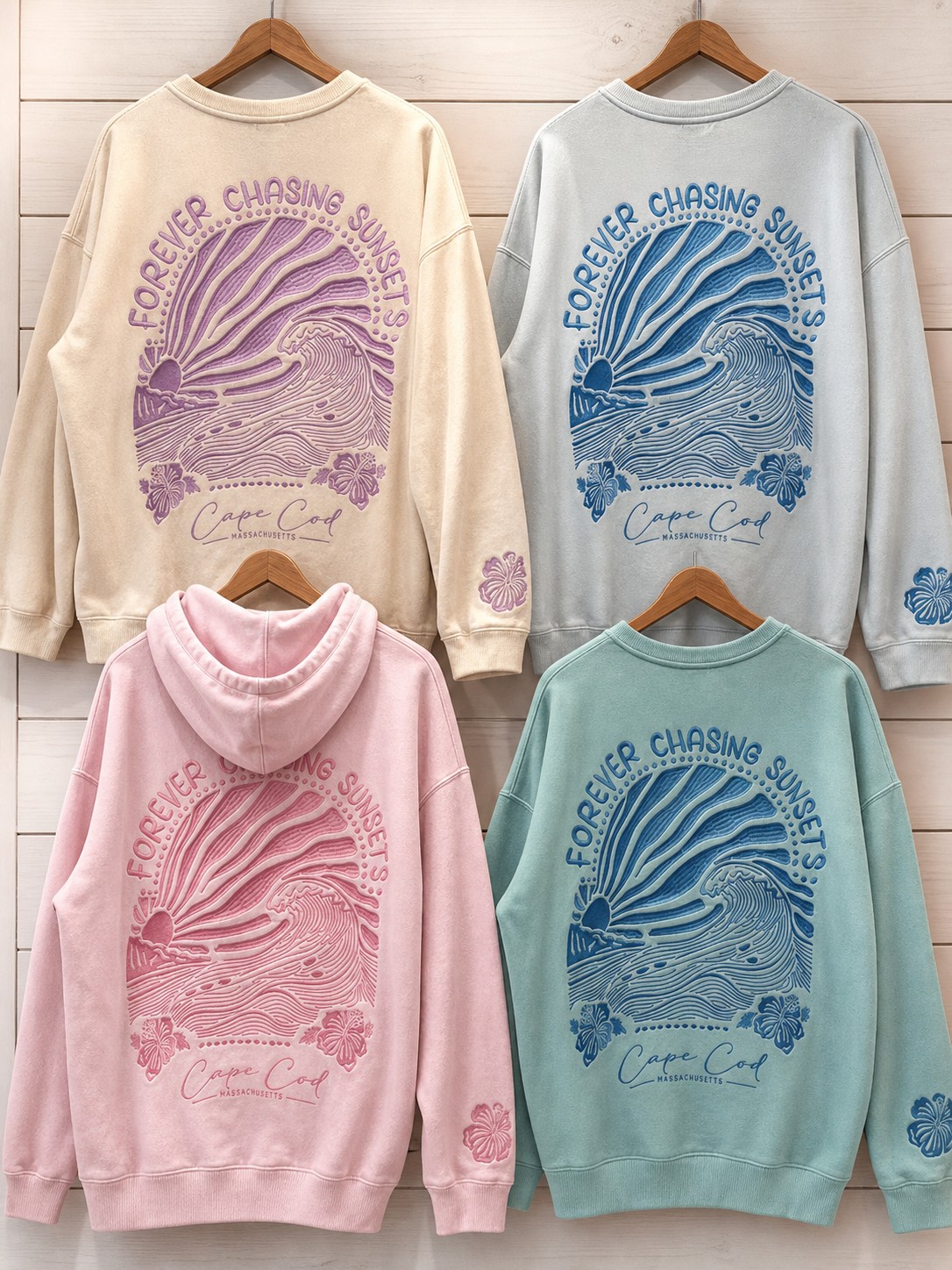 Cape Cod embroidered wave sweatshirts displayed in cream, blue, pink, and seafoam