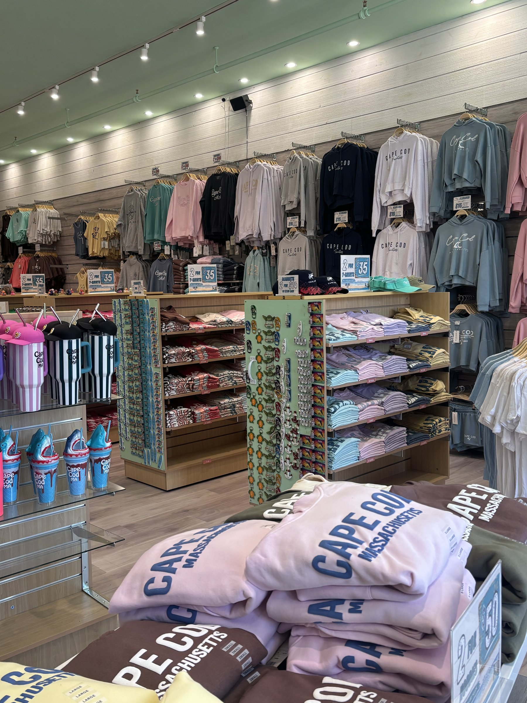 Cape Cod apparel, beach accessories, and souvenirs displayed inside Orren's Island